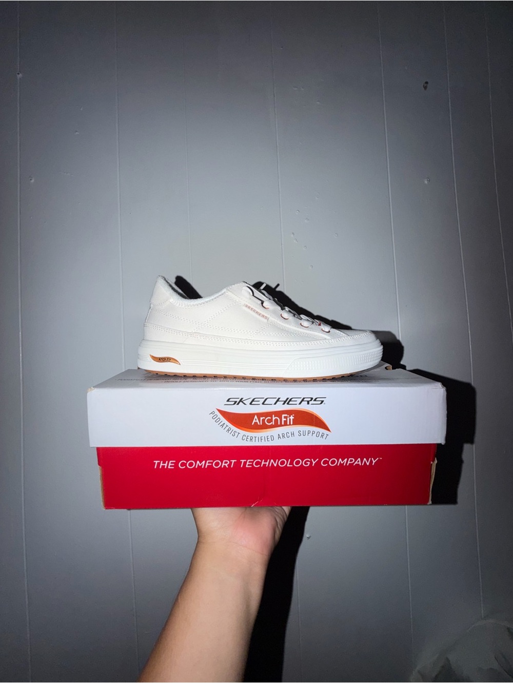 Skechers White Womens Low-Top Arch Fit Sneakers with Gum Accent